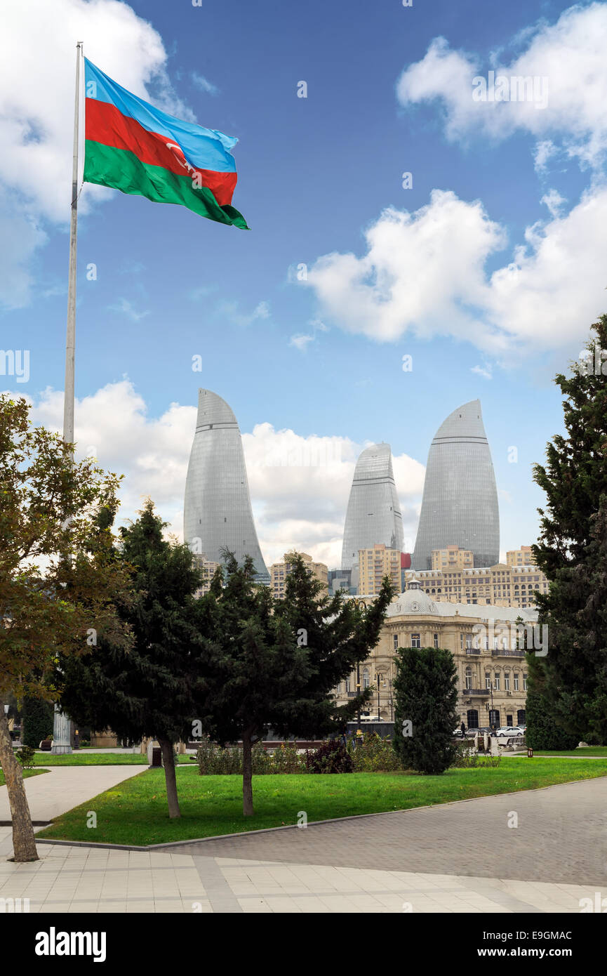 View of the Flame Towers skyscraper with Azerbaijan flag in Baku on October 17, 2014. Baku Stock Photo