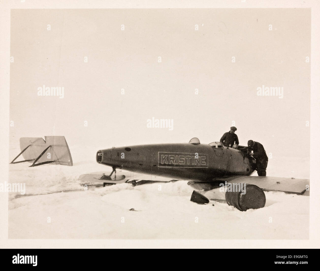 This photograph shows the assembly of the Curtiss Oriole biplane, named Kristine, in May 1923. The plane was part of the Maud Expedition led by Roald Amundsen, aimed at navigating the Northeast Passage in the Arctic. Stock Photo
