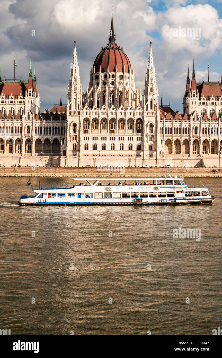 River Boat on the Danube in front of the Hungarian Parliament Building Stock Photo