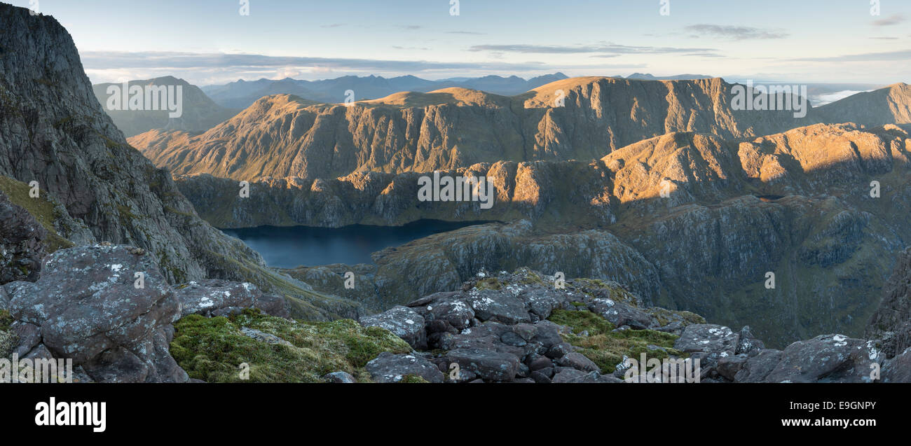 Panoramic view from A' Mhaighdean over Gorm Loch Mor to Beinn Lair and Sgurr Dubh and distant mountains of Torridon, Scotland Stock Photo