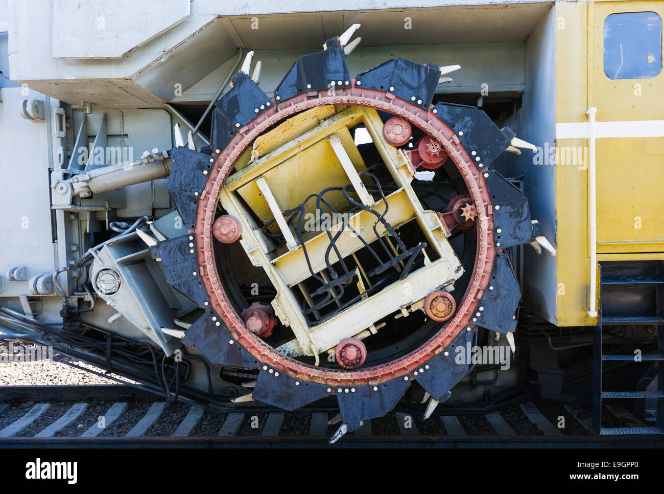 Railway rotary dredge machine. Closeup view of the rotary shovels on