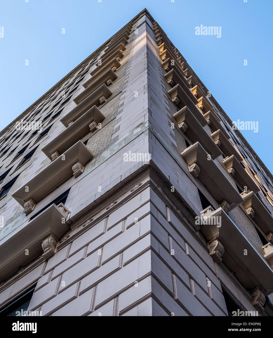 Looking up at the corner of a building. Stock Photo