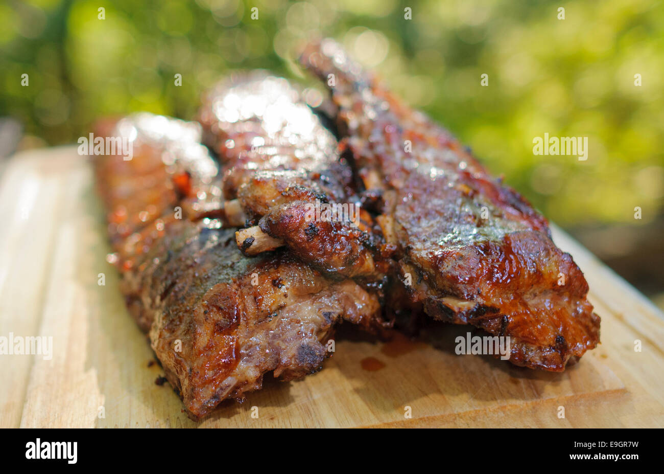 Slow cooked smoked, barbecued pork spare ribs. Stock Photo