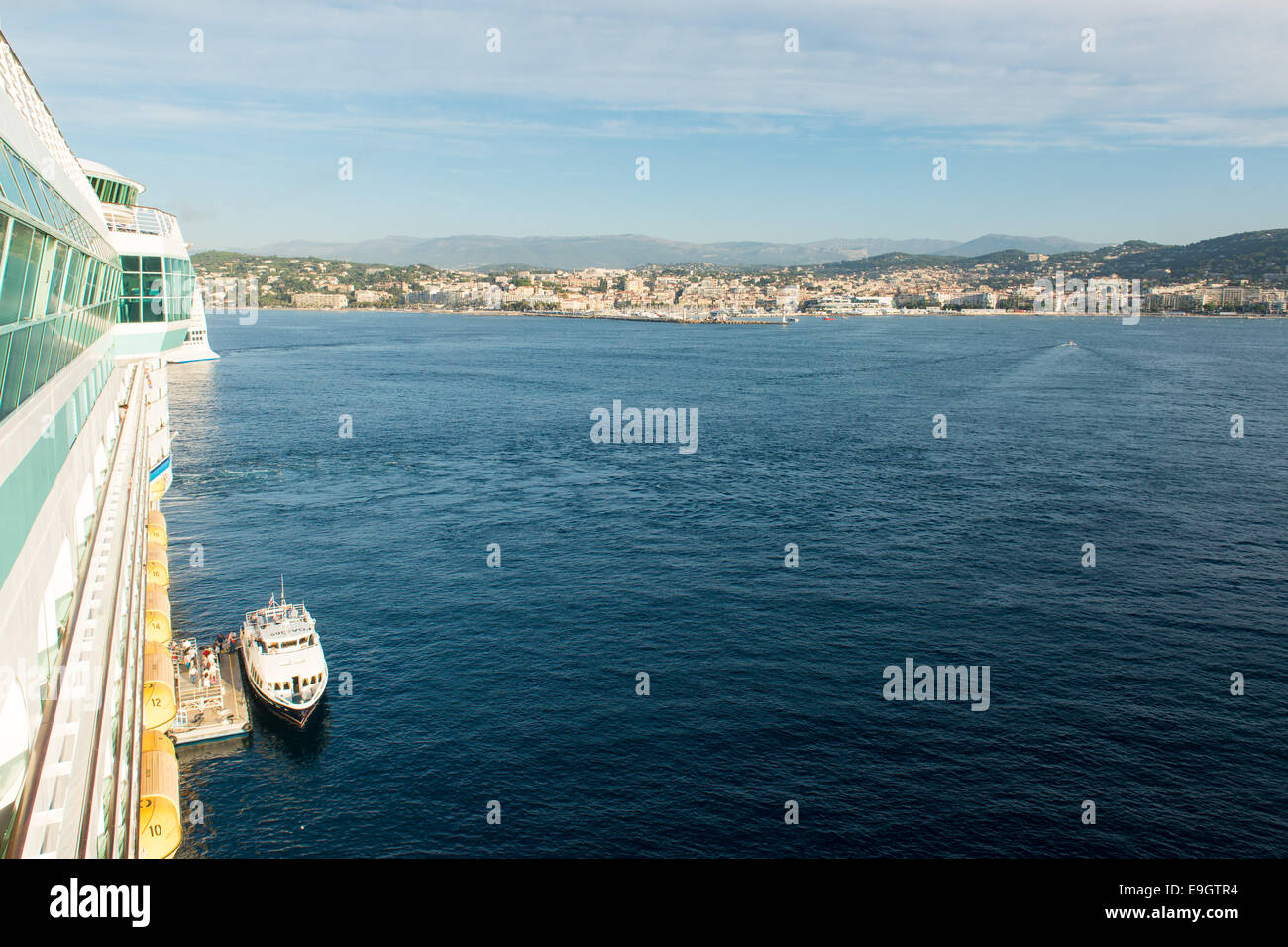 A tender boat awaits passengers to take to shore in Cannes, France, from Royal Caribbean's cruise ship Adventure Of The Seas Stock Photo