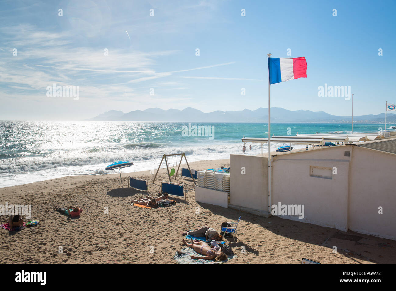 A French flag on the beach in Cannes, France Stock Photo Alamy