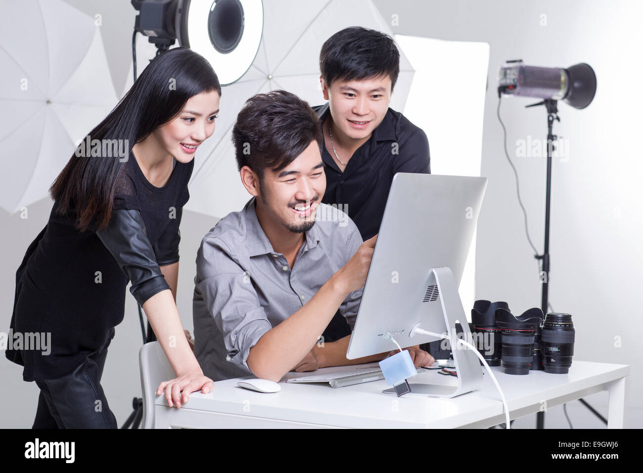 Sitting media photographers horizontal hi-res stock photography and ...