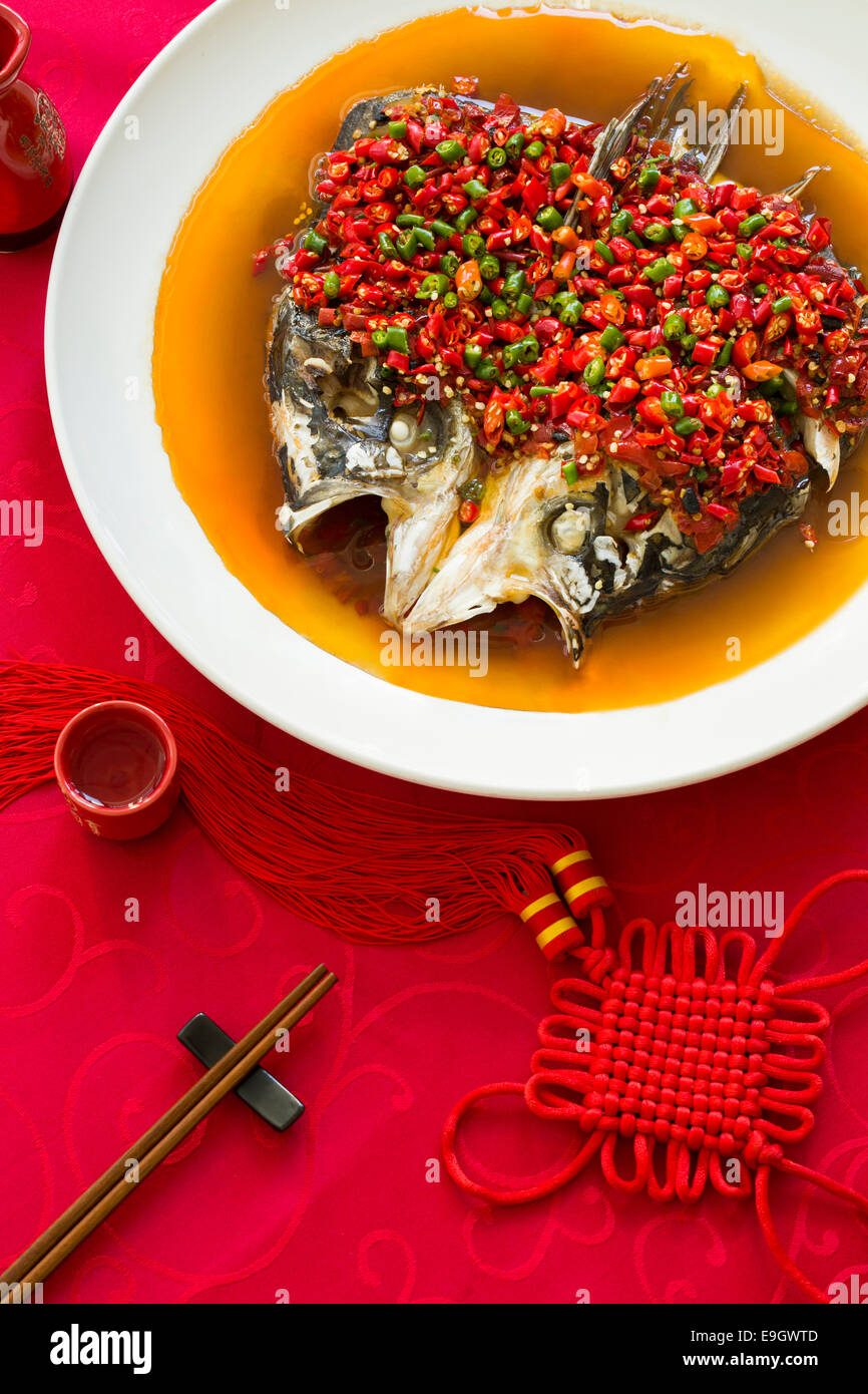 Chinese cuisine chili fish head Stock Photo - Alamy