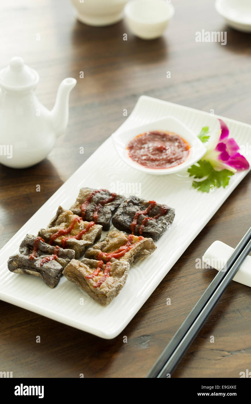 Traditional Chinese snack smelly tofu Stock Photo Alamy