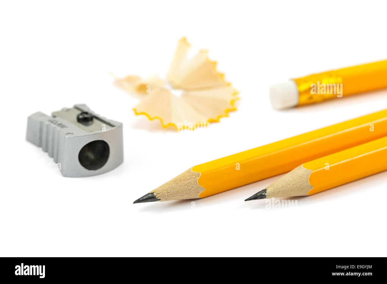 Pencils and sharpener isolated on a white background Stock Photo