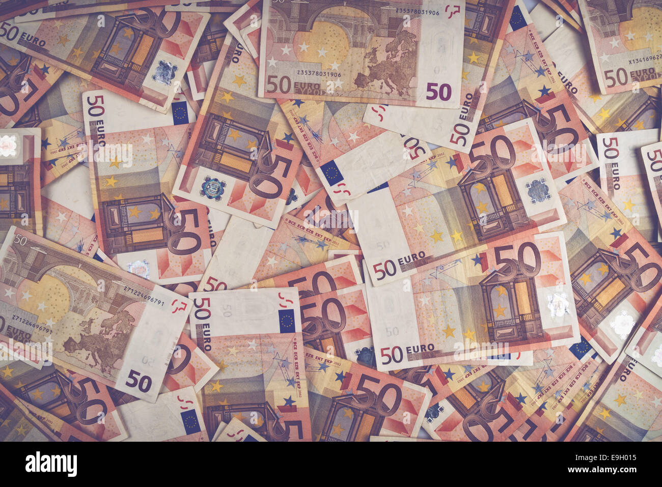 Pile of fifty euro banknotes as seamless background for financial and economy themes. Stock Photo