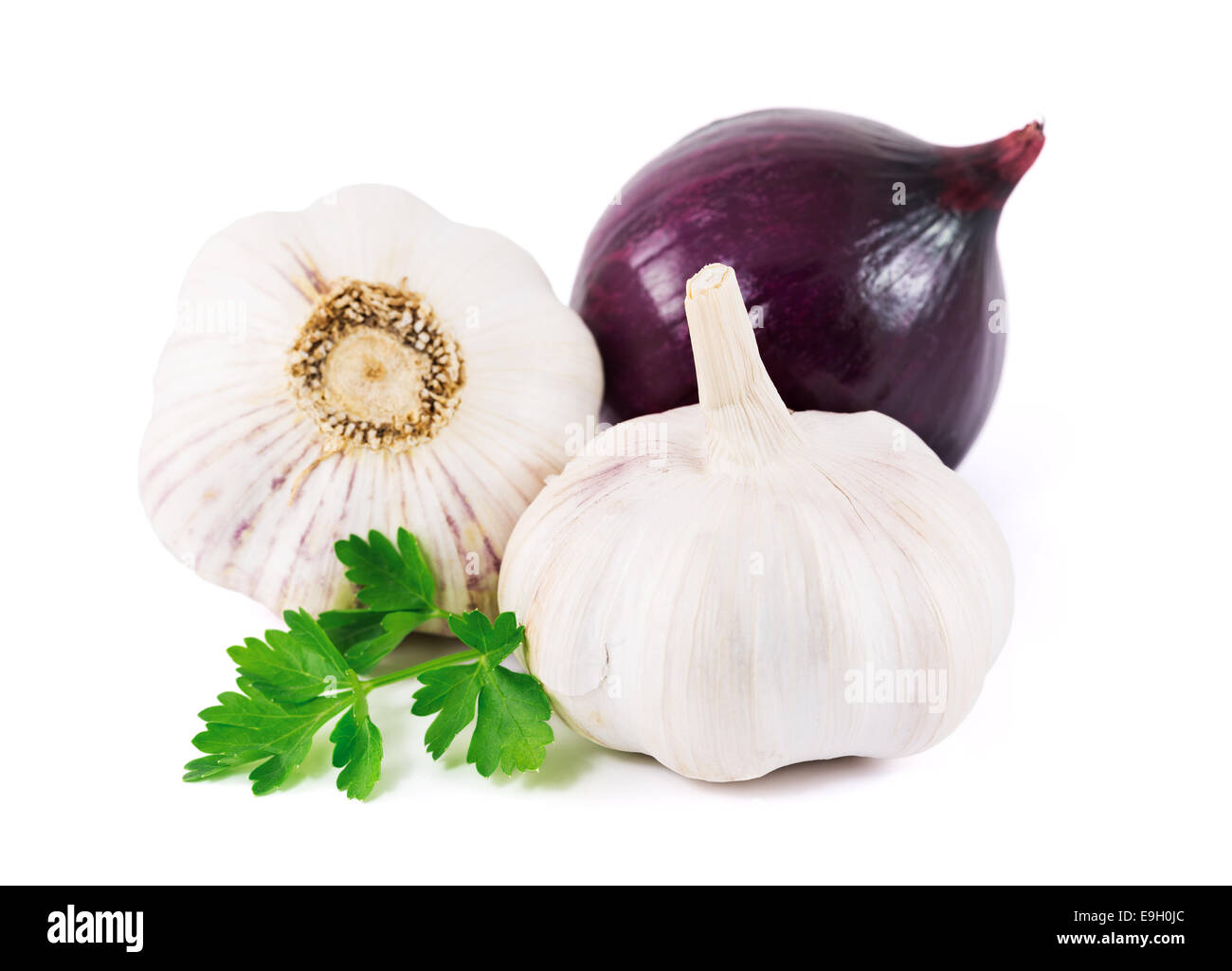 garlic and onion with parsley leaves on a white background Stock Photo ...