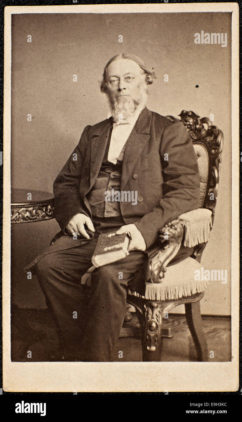 This carte de visite features a portrait of Magnus Brostrup Landstad, a notable Norwegian priest and hymn writer. The image captures his role in Norwegian religious and cultural history during the 19th century. Stock Photo
