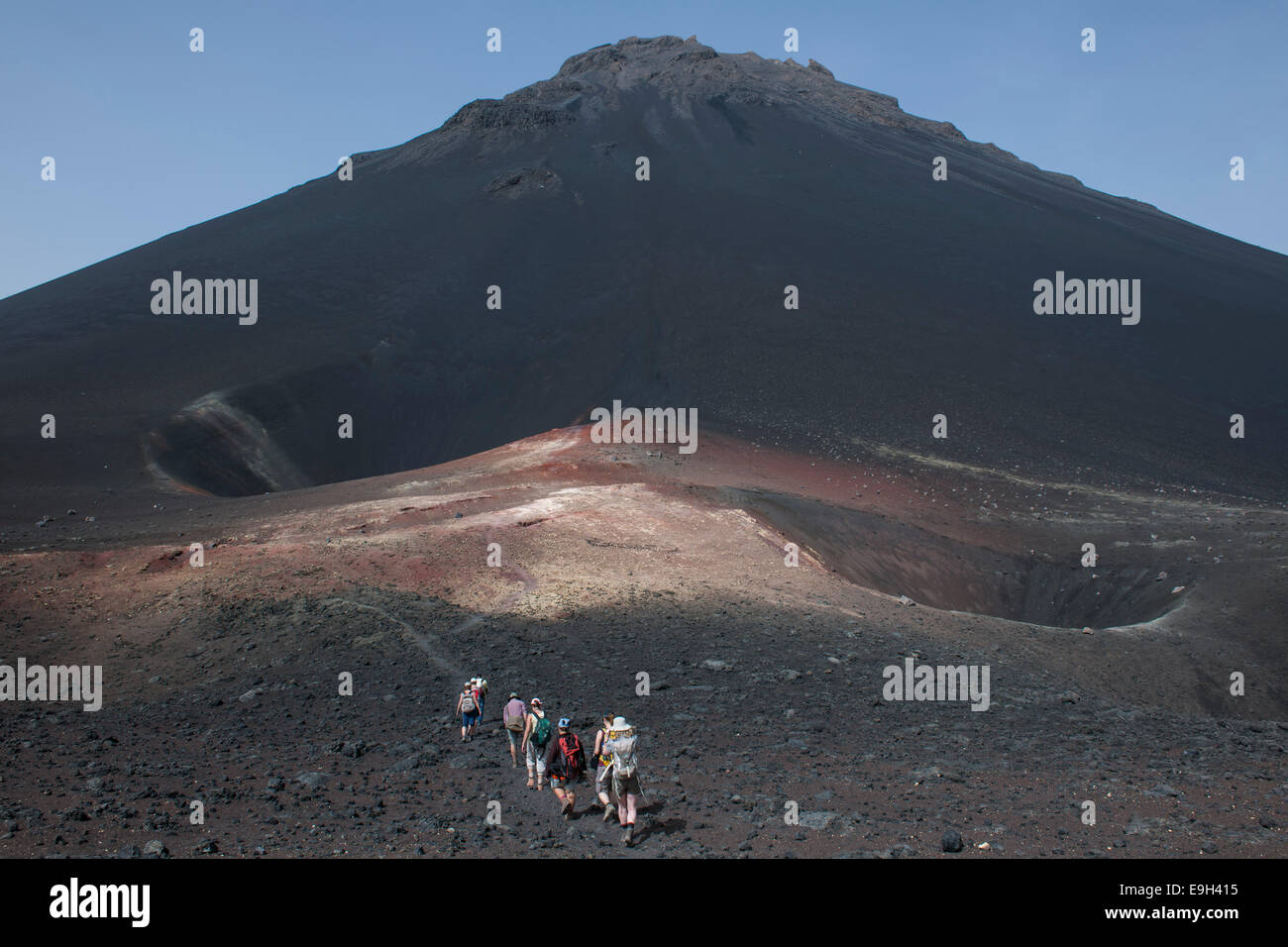 Hikers in the volcanic landscapes of the volcano Pico do Fogo, Fogo ...
