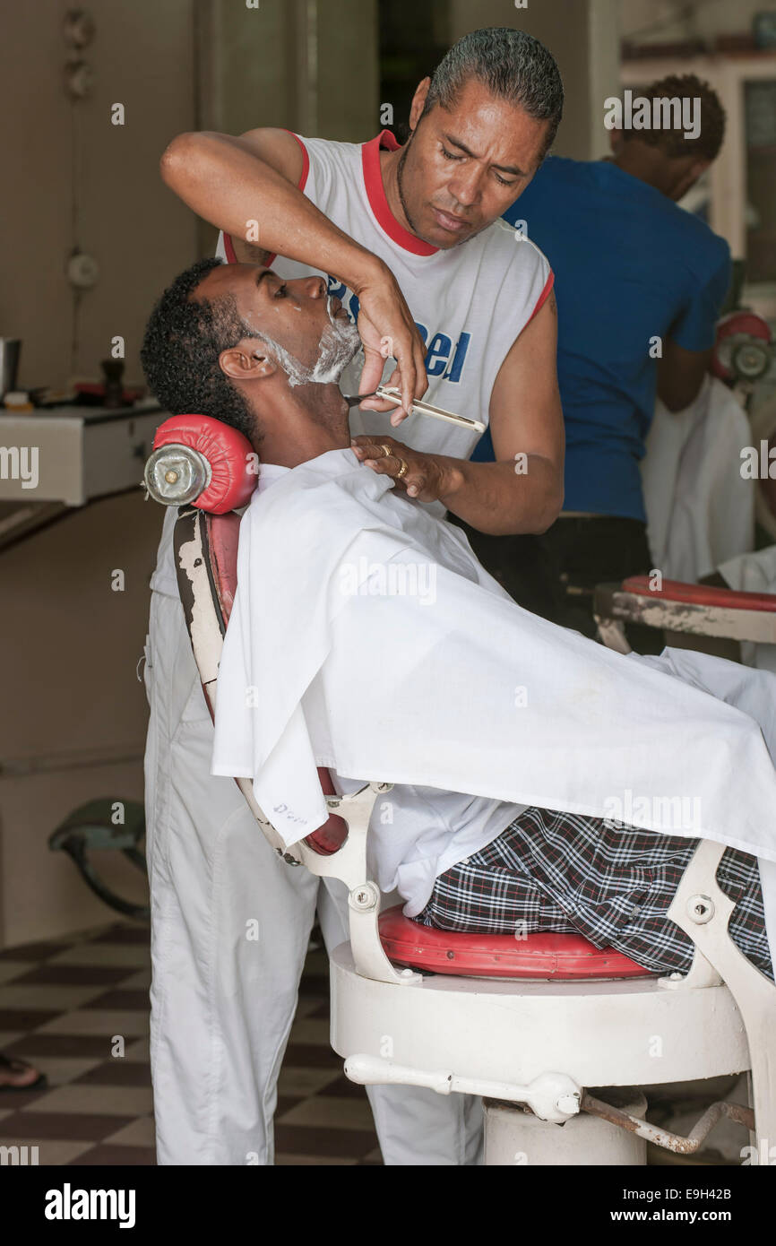 Barber at work, Mindelo, São Vicente, Cape Verde Stock Photo