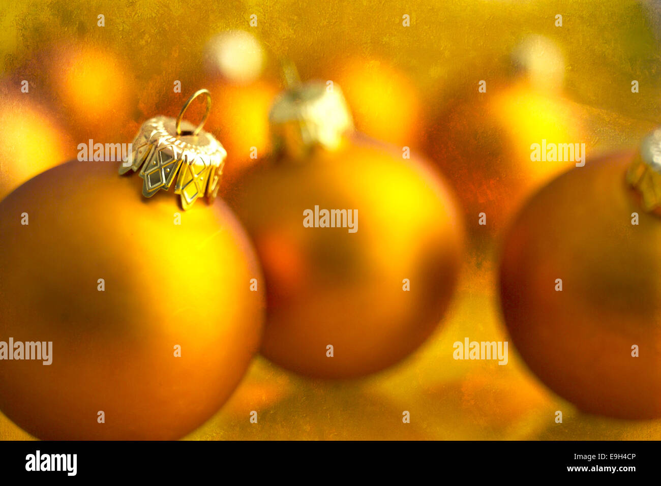 Golden Christmas baubles Stock Photo