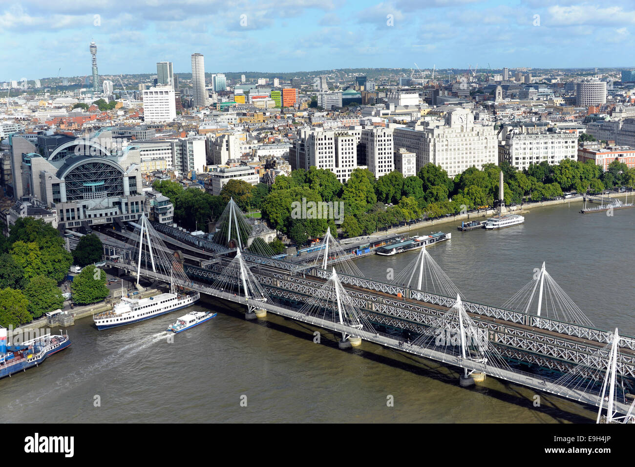 Hungerford Bridge over the River Thames with Charing Cross Station, left, London, Greater London, England, United Kingdom Stock Photo