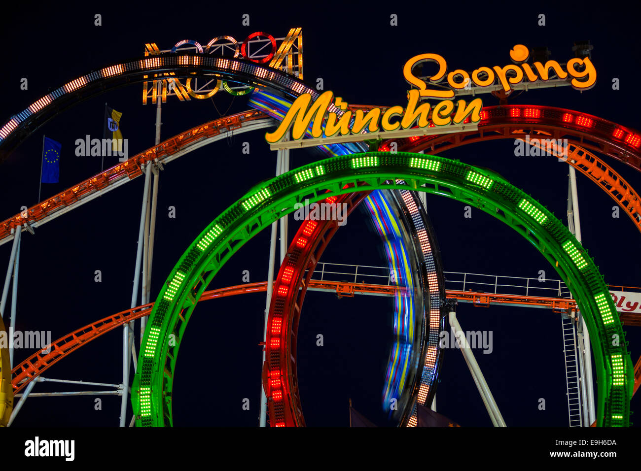 Roller coaster 'Looping' at night, Oktoberfest, Munich, Upper Bavaria, Bavaria, Germany Stock Photo