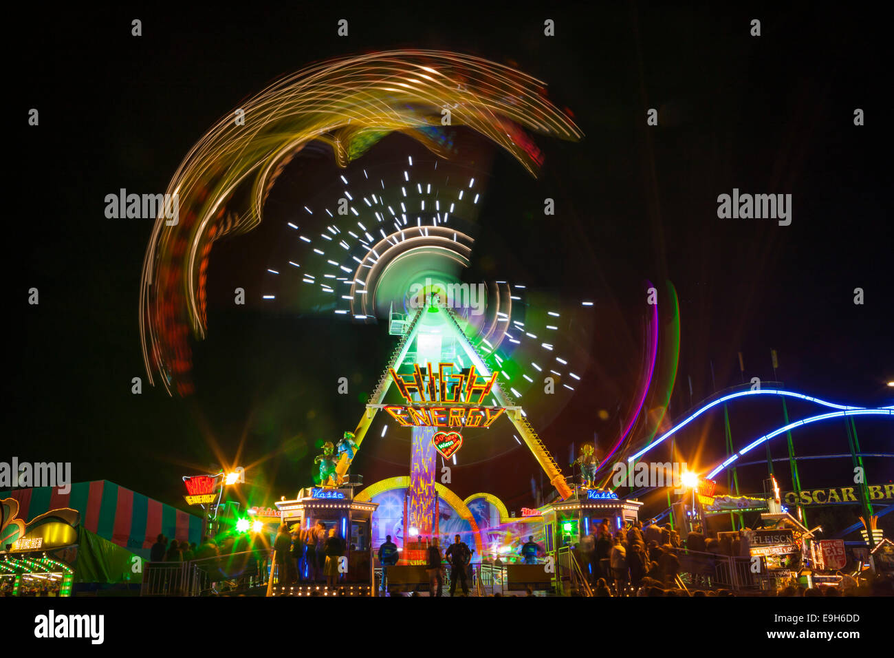 Amusement ride 'High Energy' at night, Oktoberfest, Munich, Upper Bavaria, Bavaria, Germany Stock Photo