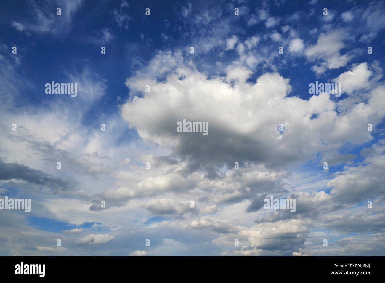Cirrus clouds and cumulus clouds Stock Photo
