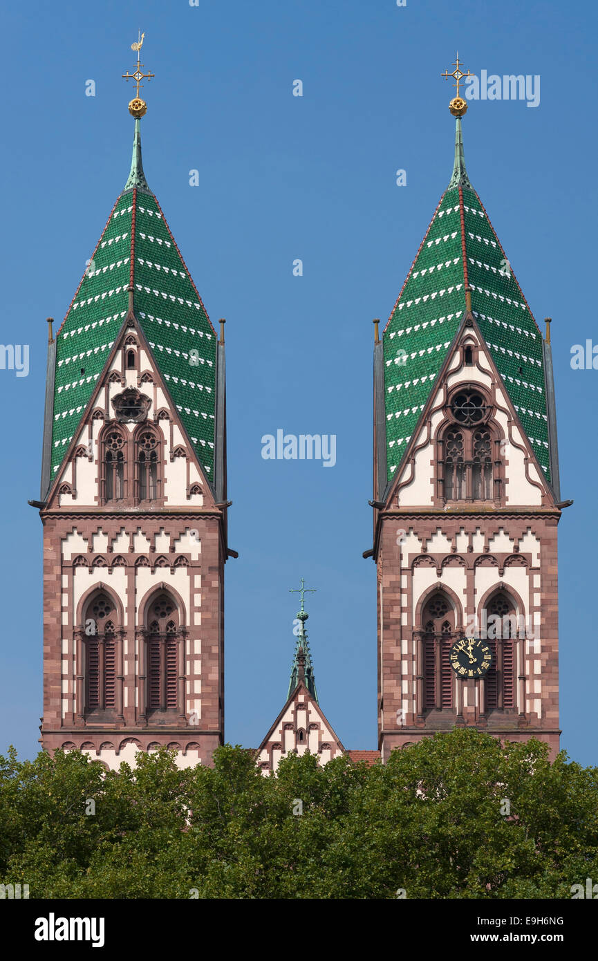 Towers of the Herz Jesu-Kirche, or Sacred Heart Church, built in the style of Historicism, consecrated in 1897, Freiburg Stock Photo