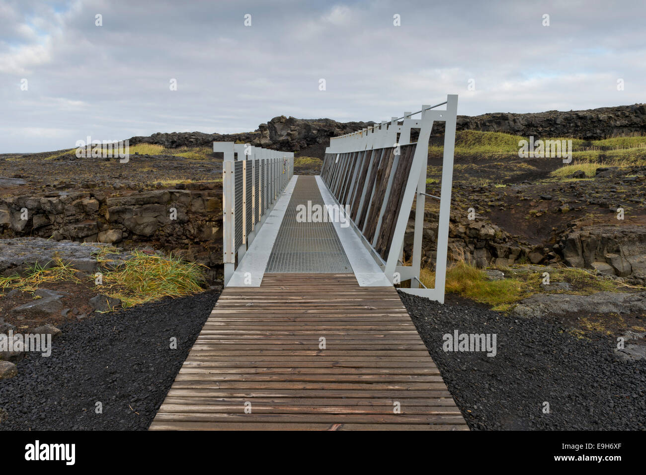 Bridge between the continents crosses the fracture zone between the American and European tectonic plates Stock Photo