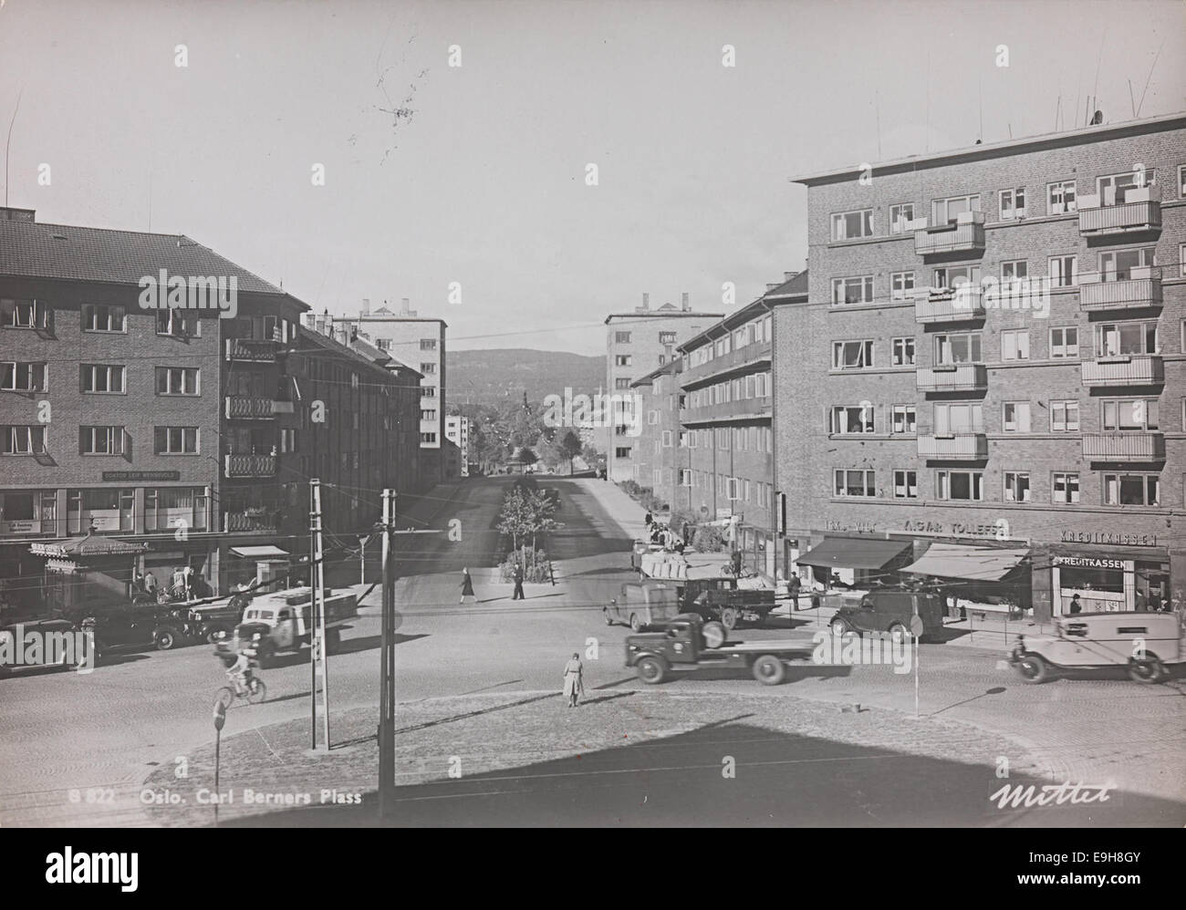 A Photograph Of Carl Berners Plass In Oslo Featuring Cars And A a-photograph-of-carl-berners-plass-in-oslo-featuring-cars-and-a