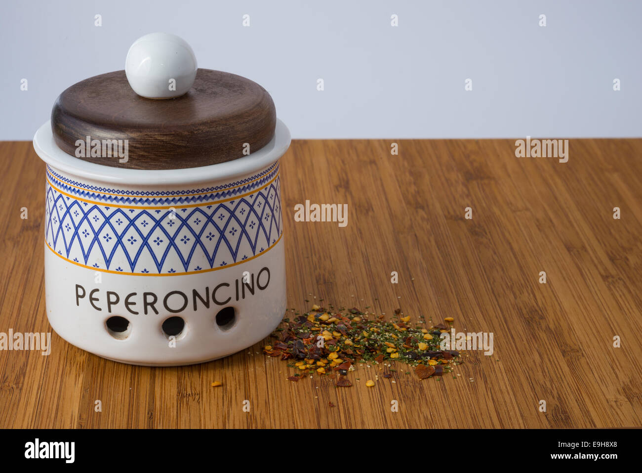 Ceramic chilly jar the word peperoncino mean chilly peppers Stock Photo