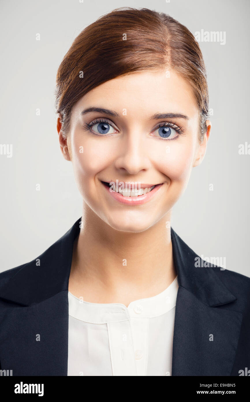 Portrait of a beautiful blonde woman with blue eyes smiling Stock Photo ...