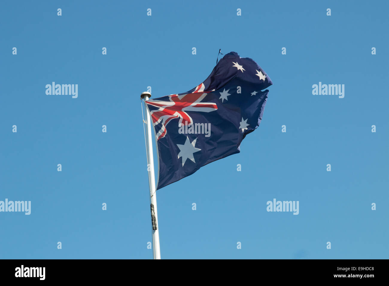 australia's national flag flying against blue clear sky,sydney Stock Photo