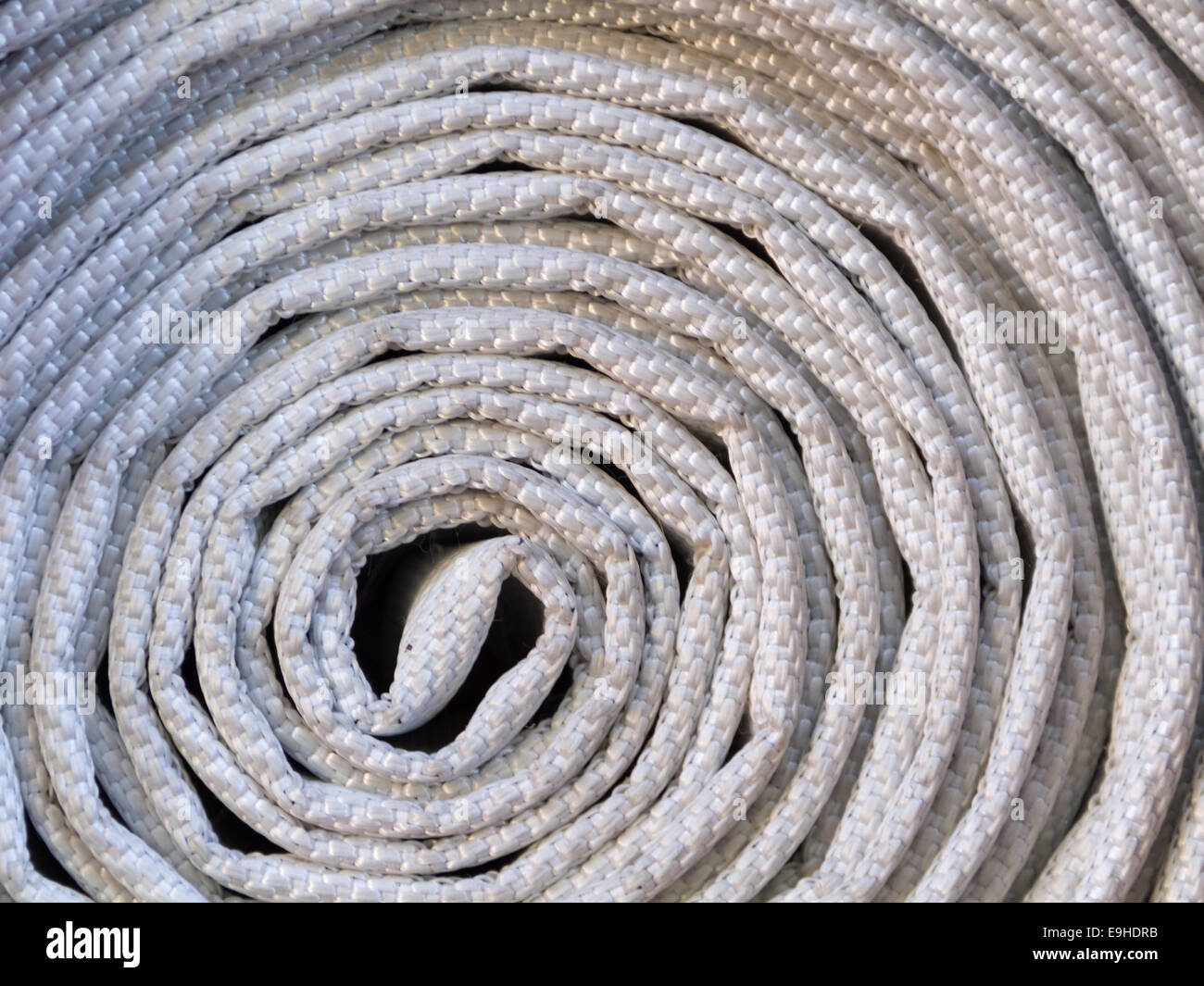 rolled fire hose Stock Photo