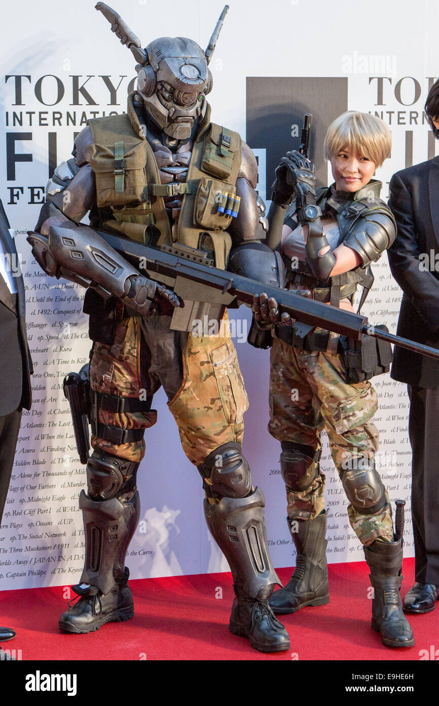 Tokyo, Japan. 23rd Oct, 2014. Actress Asuka Kishi (R) and a cartoon  character from 'Appleseed Alpha' (L) attend the red carpet opening ceremony  during the 27th Tokyo International Film Festival in downtown