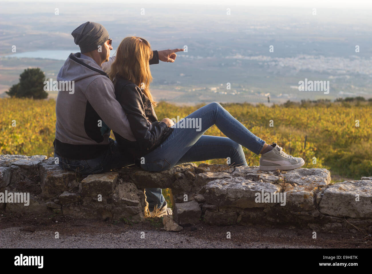 couple date dating outdoors spring 'copy space' relationship sunset silhouettes hug vacation Stock Photo