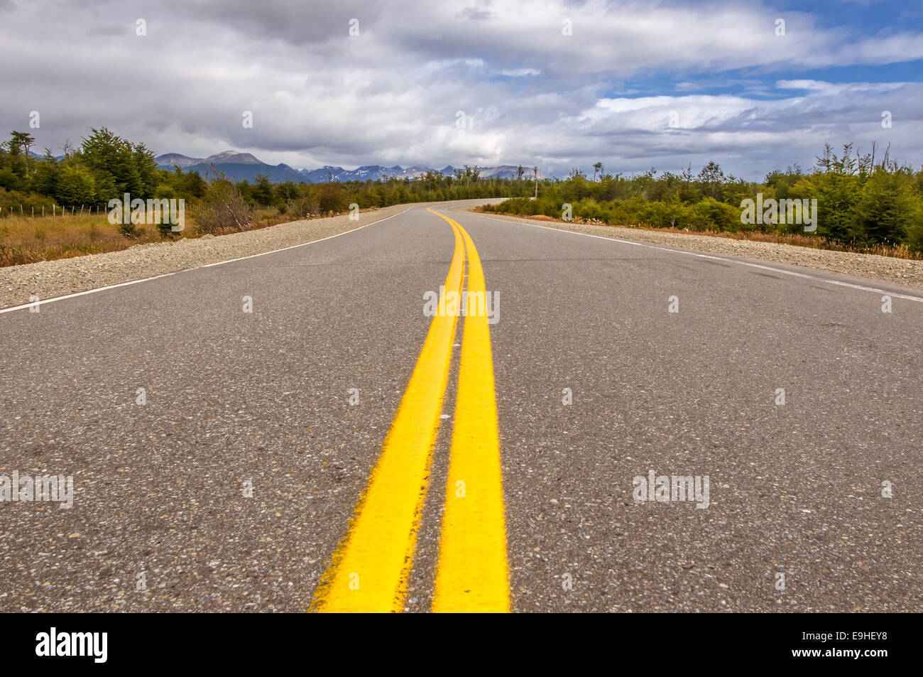 vibrant image of highway and blue sky Stock Photo - Alamy