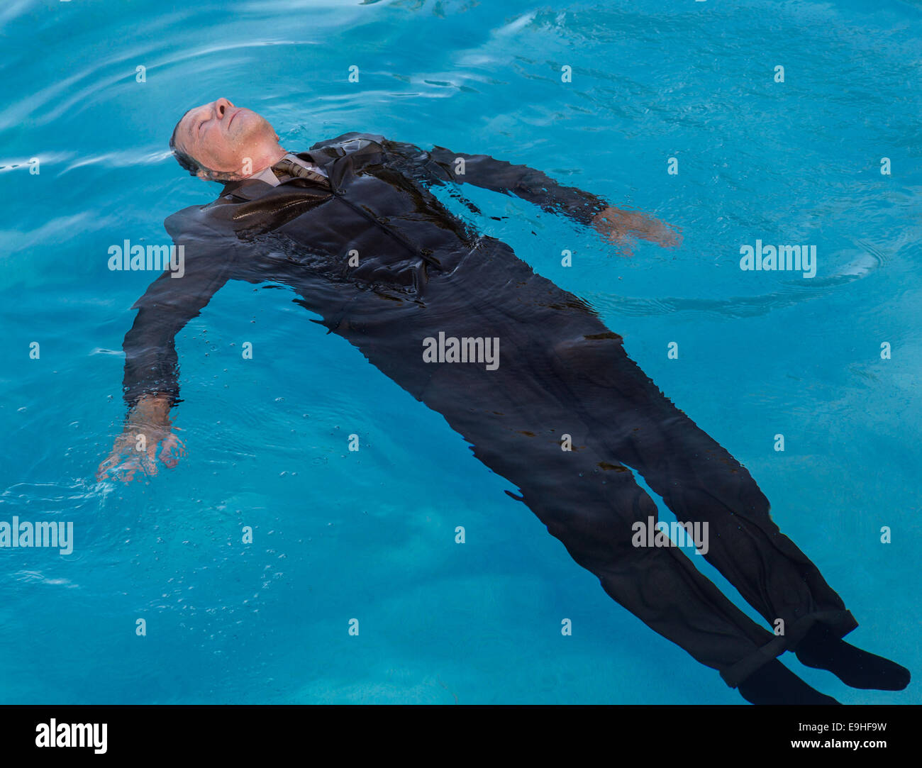 Senior man floating on back in water Stock Photo