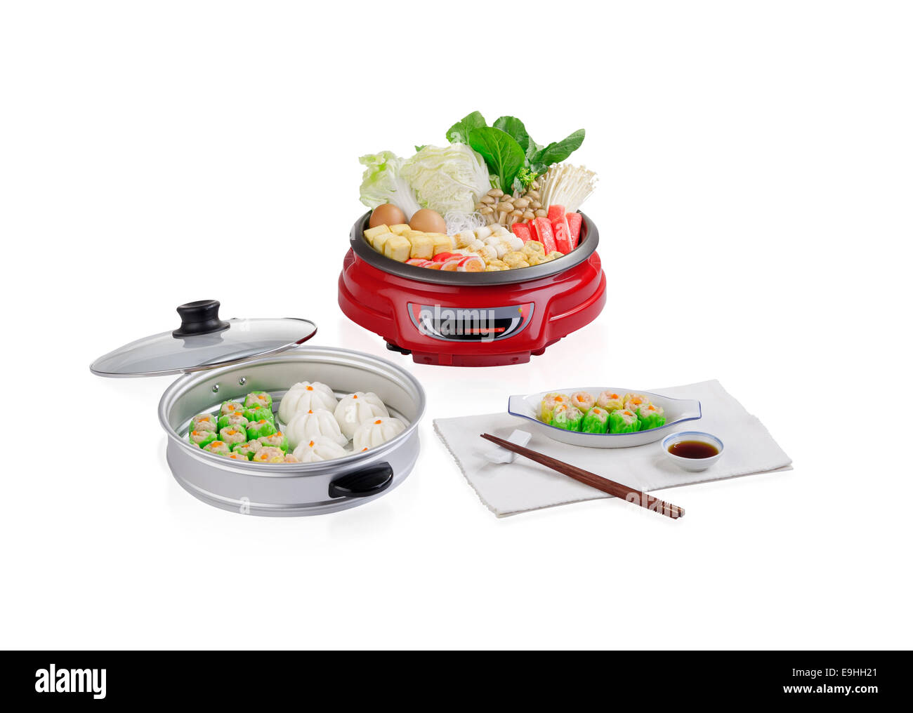 Sukiyaki electric pot with steamed tray isolated on white Stock Photo