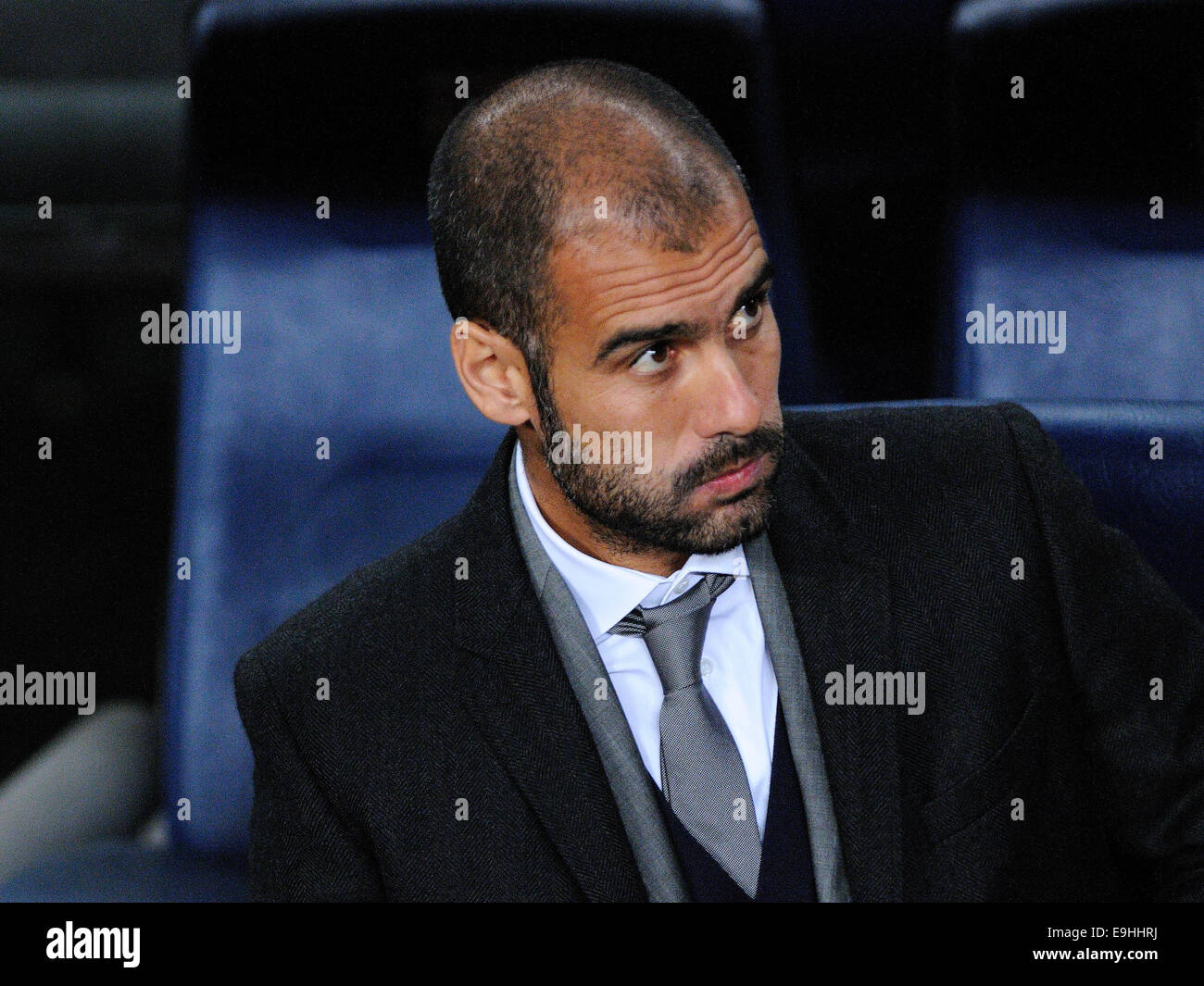 BARCELONA - NOV 10: Josep Pep Guardiola sitting on the bench at the Camp Nou Stadium on the Spanish Cup (Copa del Rey). Stock Photo