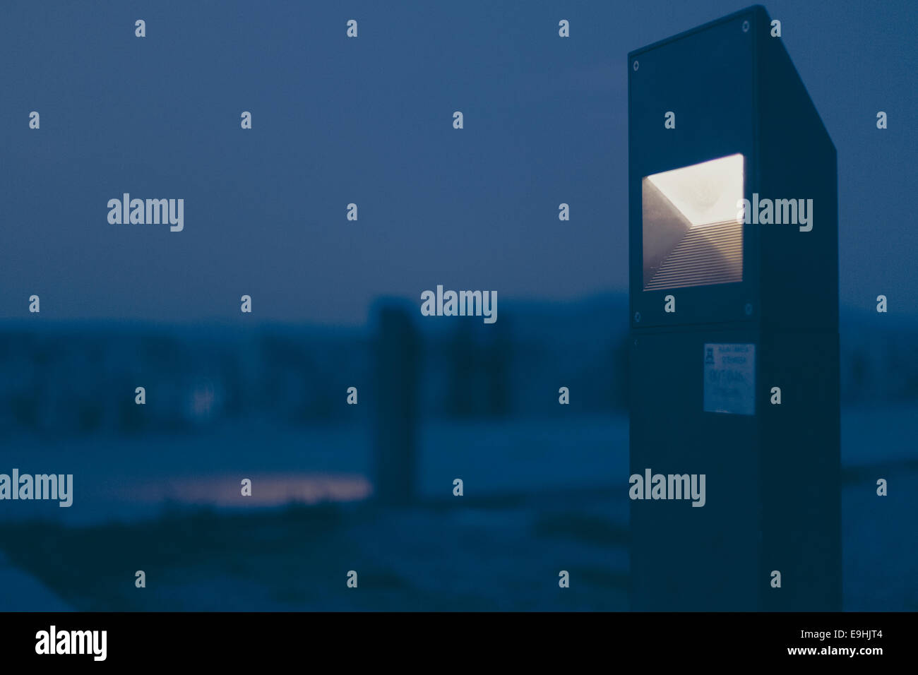 Modern architectural light fixture at night Stock Photo Alamy