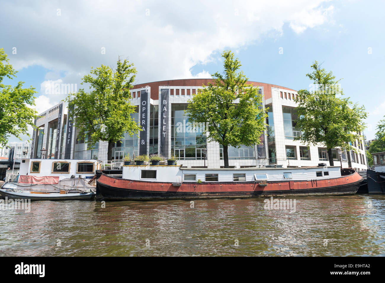 Dutch opera and ballet building seen from a canal, Amsterdam, Netherlands Stock Photo