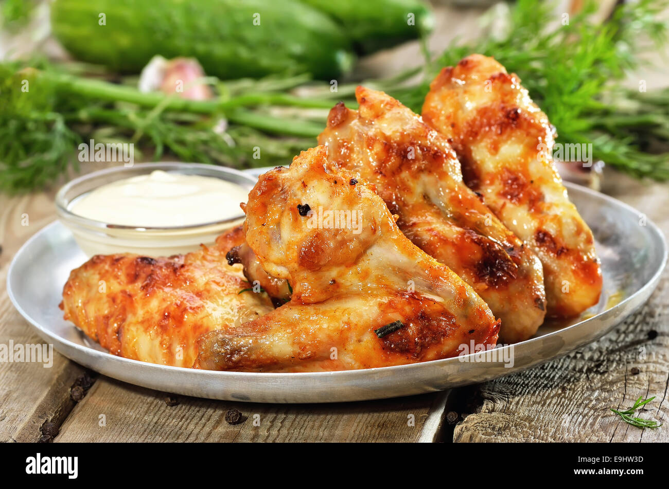 Fried chicken wings with sauce Stock Photo - Alamy