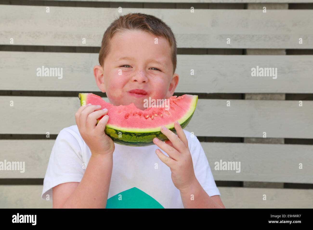Child eating watermelon hires stock photography and images Alamy