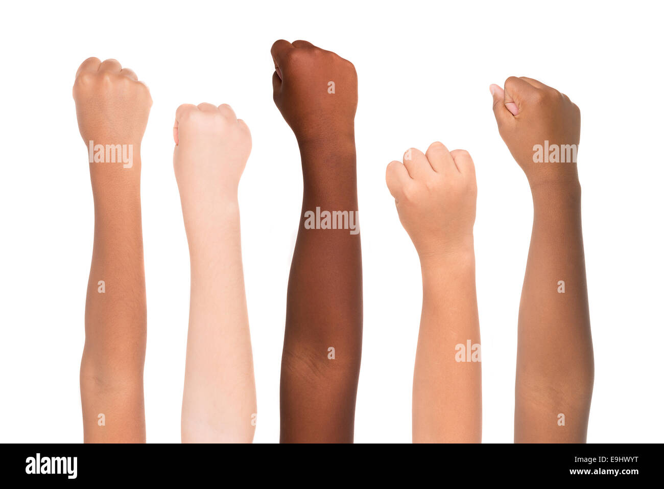 Children's hands from different colors and races together isolated in white Stock Photo