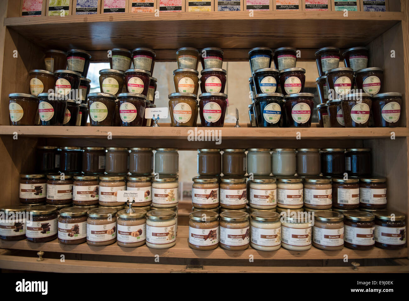 a display of jars containing jams in a food shop in paris Stock Photo Alamy