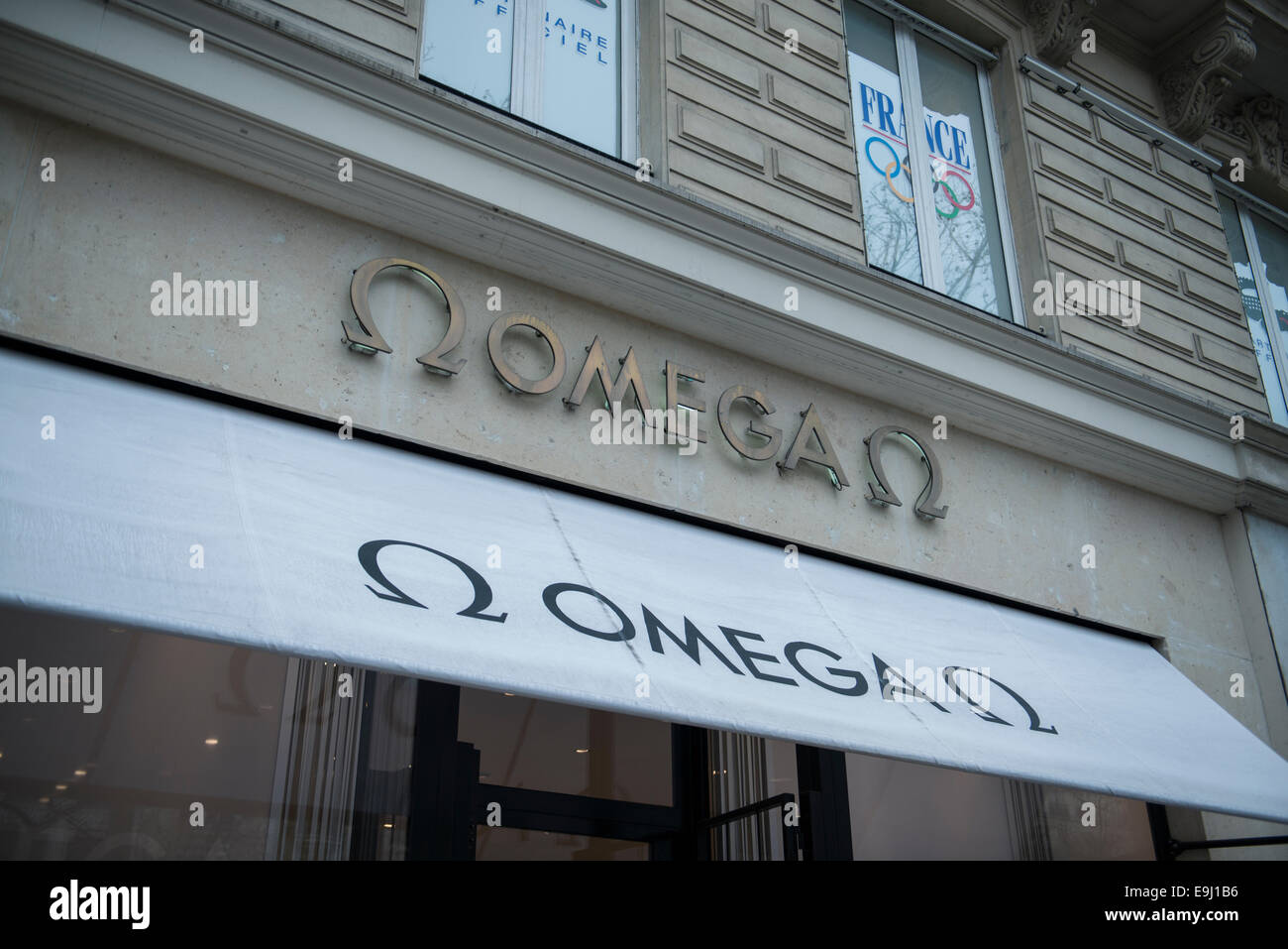 shop signs on high end luxury designer brands in Paris france Stock Photo
