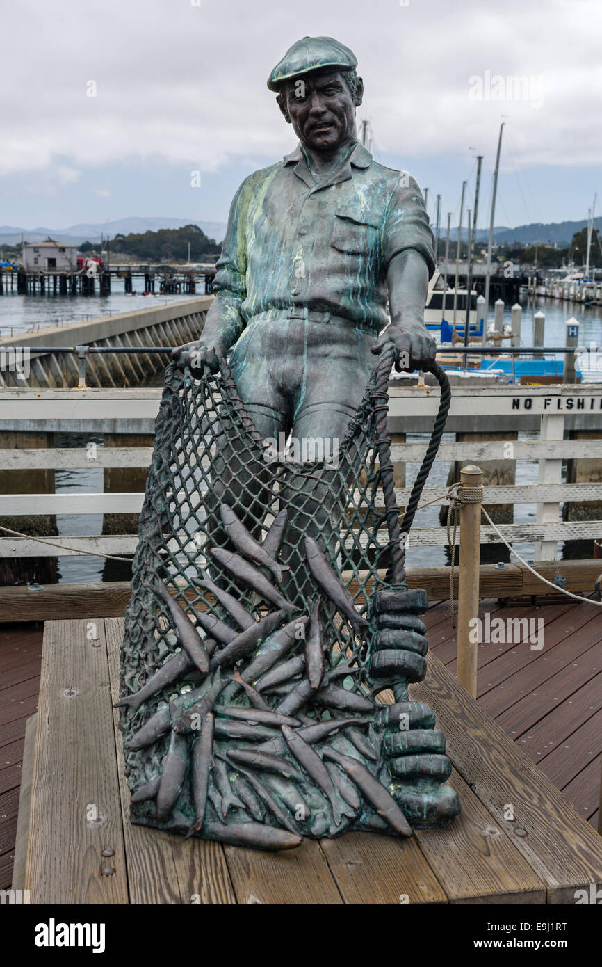 Sculpture of a fisherman at the end of Old Fisherman's Wharf, Monterey, California, USA Stock Photo