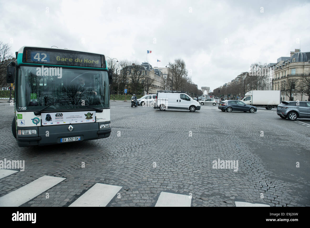 public transport a bus makes a turning on a paris cobbled street Stock  Photo - Alamy