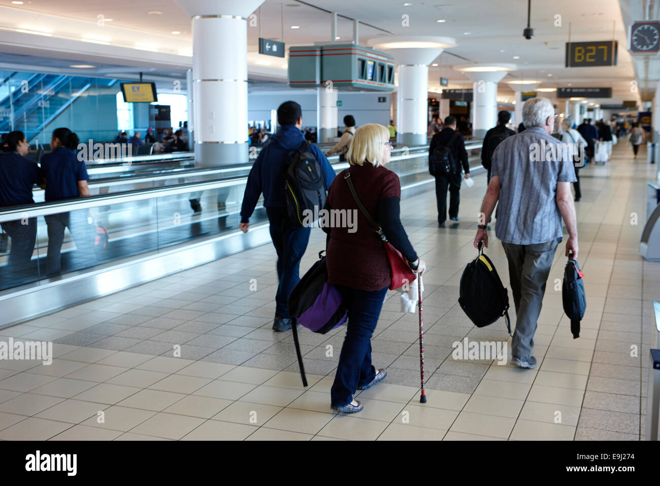 woman passenger with walking stick at terminal 3 toronto pearson international airport Canada Stock Photo