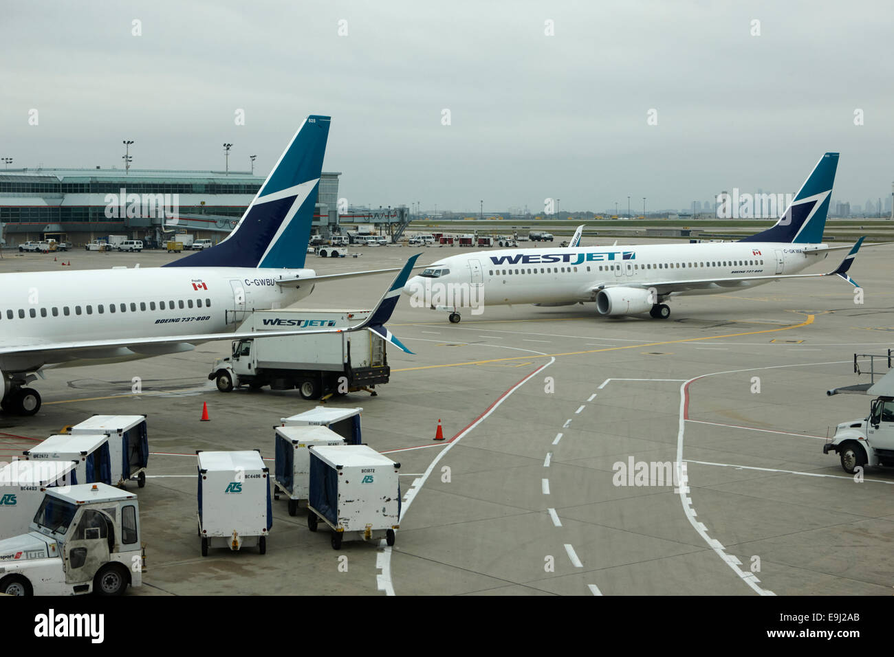 westjet aircraft arriving at terminal 3 toronto pearson international airport Canada Stock Photo