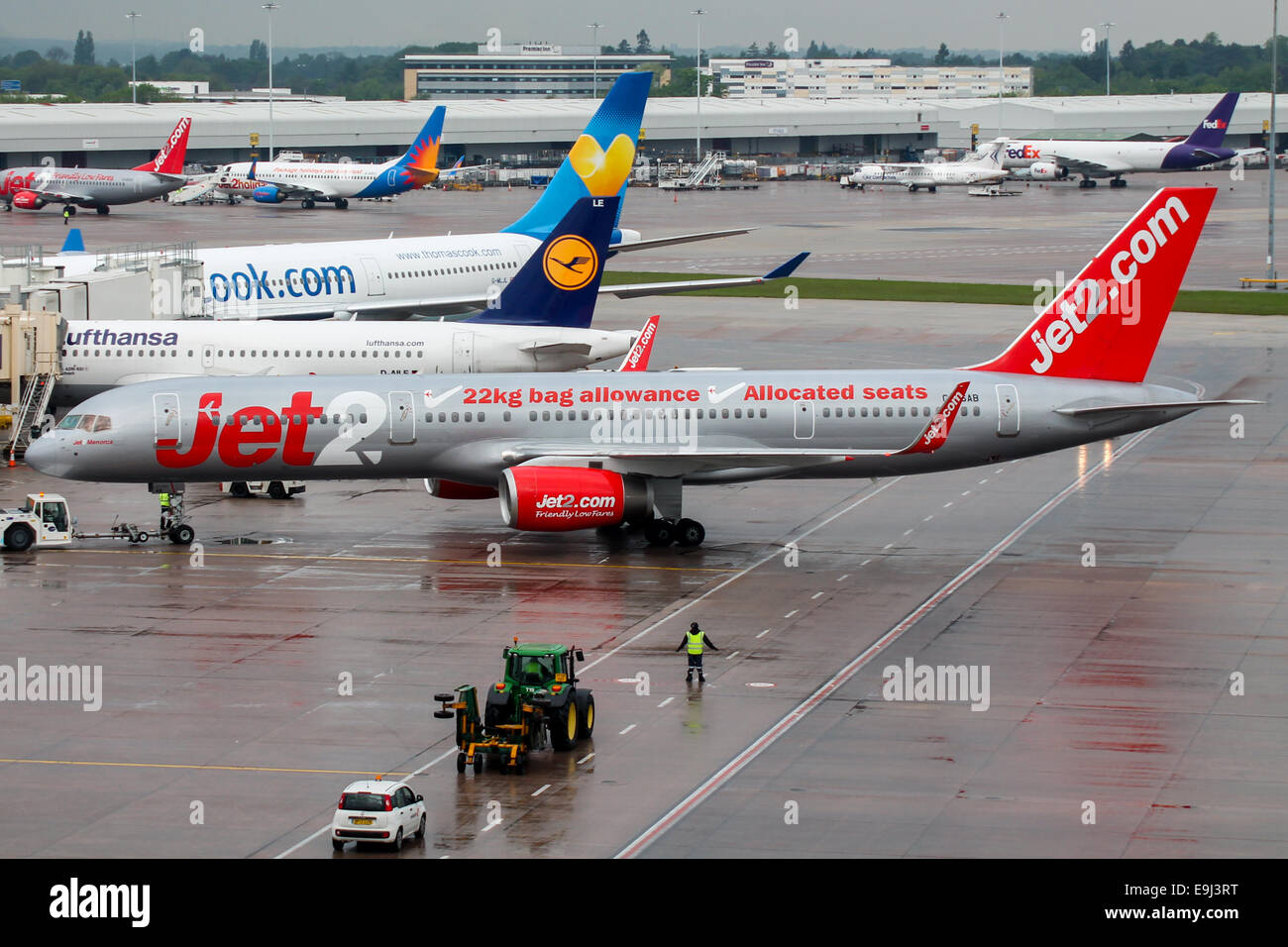 Jet2 Boeing 757-200 pushes back from terminal 1 at Manchester airport. Stock Photo