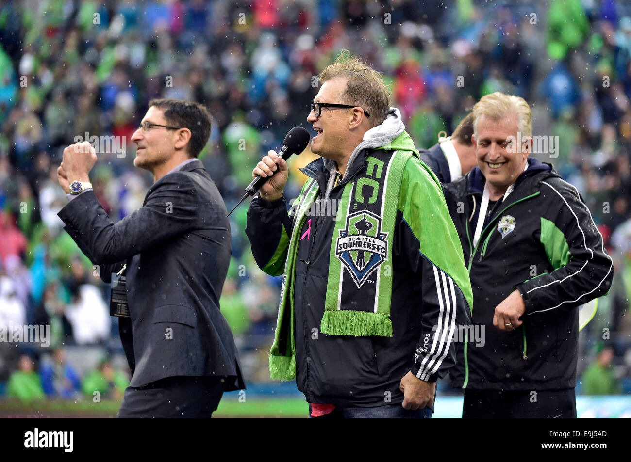 October 25, 2014. Seattle Sounders FC owner Drew Carey addresses Seattle fans after beating the Los Angeles Galaxy and winning their first Supporters Shield while owners Joe Roth and Adrian Hanauer join him on stage at CenturyLink Field in Seattle, WA. Seattle Sounders FC defeats Los Angeles Galaxy 2 - 0.George Holland/Cal Sport Media. Stock Photo