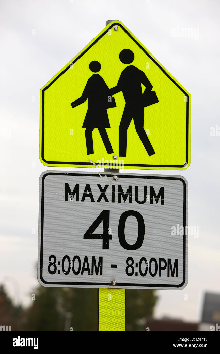 maximum 40 school zone warning sign outside school in Saskatchewan Canada Stock Photo